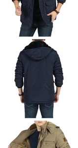 Detail of winter hooded parka with plush lining and ribbed cuffs in navy and khaki