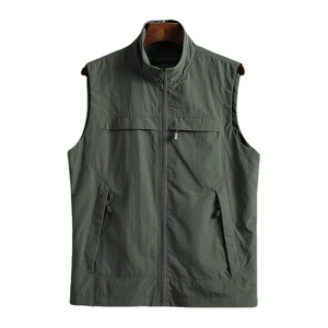 Detailed view of durable deep olive green outdoor utility vest with zip pockets