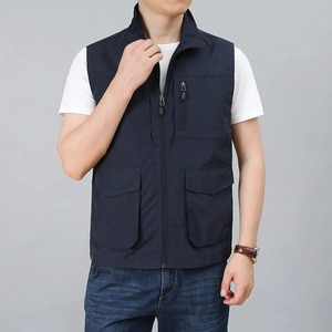 Men's dark blue multi-pocket utility mesh vest with high collar and zipper closure