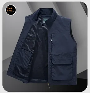 Detail of dark blue outdoor vest featuring breathable mesh lining and utility pockets