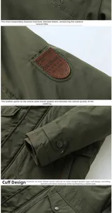 Detailed view of army green outdoor jacket with windproof cuffs and embroidered logos