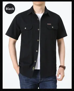 Dettaglio camicia cargo nera a maniche corte in cotone con tasche a patta ed etichette tessute
