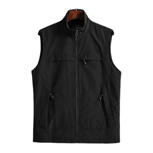 Close-up of black outdoor vest featuring a stand collar and high-quality zipper detail