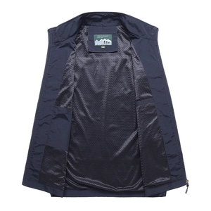 Detail view of navy blue outdoor vest featuring breathable mesh lining and inner pocket