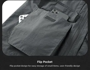 Detail view of the large flap pocket on outdoor cargo vest with secure velcro closure