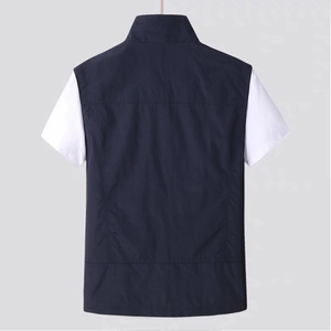 Back view of a navy blue outdoor utility vest for men with stand collar and pocket detail