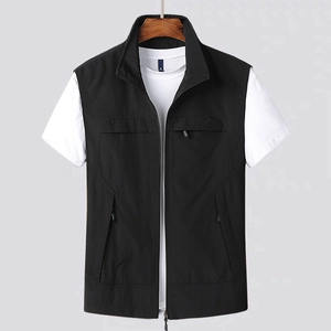Men's outdoor utility vest in black with multiple zip pockets and a stand collar