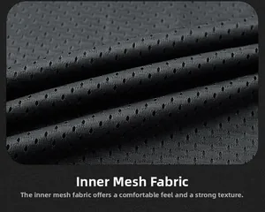 Detail of breathable black mesh lining on the vest showing honeycomb texture and softness