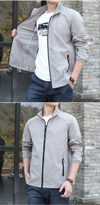 Détail de la veste de protection solaire gris clair pour homme avec zip et logo
