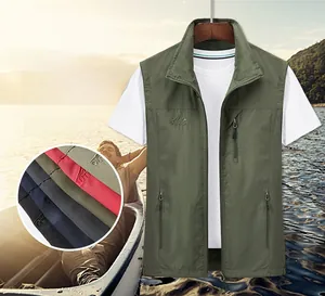 Detail of multi-pocket outdoor fishing vest showing durable zipper and embroidered logo