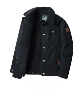 Detailed view of men's black jacket with grey fleece lining and arm shield badge