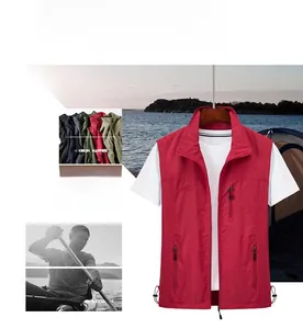 Detail view of outdoor vest featuring multi-zipper pockets and adjustable hem drawstring