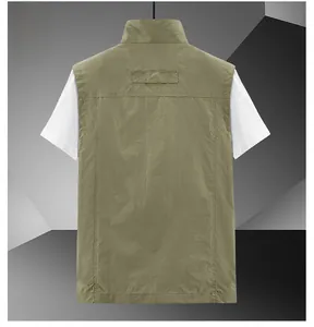 Detail view of khaki vest back with stand collar, zip closure and textured fabric