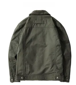 Detailed back view of military green fleece-lined jacket with decorative fashion label