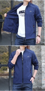 Détail de veste de protection solaire bleue pour hommes avec poche interne et zips orange