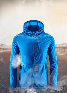 Detail of blue breathable sun protection jacket featuring lightweight hooded design