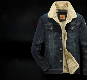 Detail of warm winter denim jacket with thick faux shearling fleece lining and collar