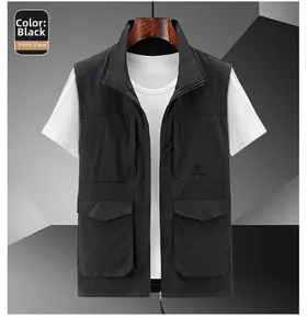 Close-up of black outdoor vest with multiple large pockets and stand-up collar detail