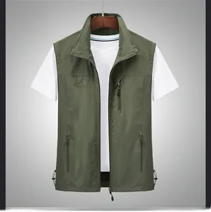 Detail view of military green outdoor vest featuring stand collar and zipper pockets