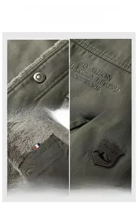 Close-up of vintage outdoor jacket featuring warm fleece lining and metallic snap buttons