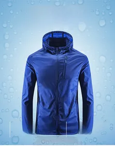 Detail of blue men's lightweight sun protection jacket with hood and zipper pockets