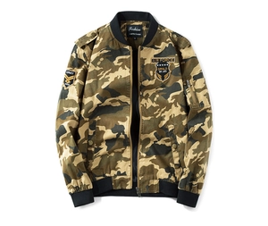 Detail of military-style embroidered patches on camouflage cotton bomber jacket sleeve