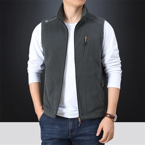 Men's dark grey fleece vest with standing collar, zipper pockets and chest print