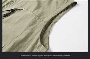 Detailed view of stitch seam and secure zipper pocket on khaki outdoor vest