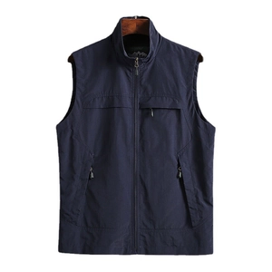 Men's navy blue outdoor vest with stand collar, zip pockets and windproof material