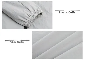 Détail de la texture du tissu gris clair et du poignet élastique de la veste pour homme