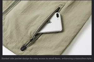 Detail of multi-pocket outdoor vest featuring a secure side zipper pocket for smartphones