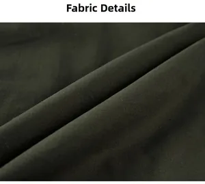 Gros plan détaillé de la texture et du matériau d'un blouson en coton épais vert olive
