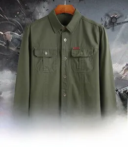 Detail of army green cotton cargo shirt with double chest pockets and outdoor label