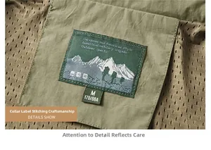 Macro detail of military green vest collar with mesh lining and mountain logo neck label