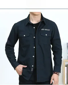 Detail of navy blue cotton work shirt with OFF-ROAD embroidery and chest pockets