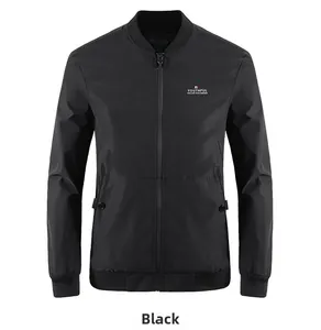Close-up of windproof black jacket featuring ribbed cuffs and white logo print