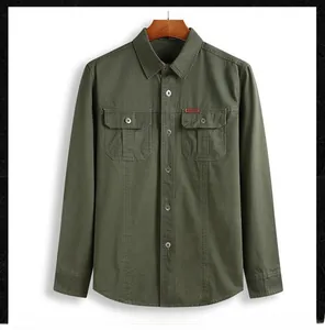 Detail showing army green cotton shirt with dual chest pockets and outdoor label
