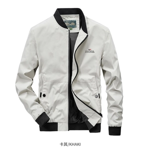 Close-up of khaki bomber jacket collar and youthful print detail with ribbed cuffs