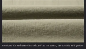 Detail view of the breathable scratch-resistant fabric texture in olive green vest