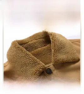 Detail of khaki men's fleece-lined jacket featuring warm faux fur collar and embossed buttons