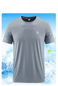 Detail of light grey men's crewneck t-shirt featuring 1961 logo and breathable fabric texture