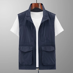 Men's outdoor utility vest in navy blue with multiple large pockets and zipper front