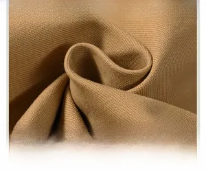 Macro shot of durable brown canvas fabric texture for men's winter thickened jacket