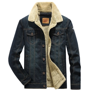 Men's dark blue denim jacket with warm sherpa lining and classic workwear pockets