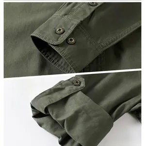Close-up of military green cotton shirt cuffs with durable stitching and buttons