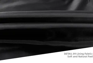 Detail view of smooth black satin inner lining fabric for men baseball jacket