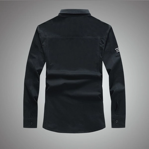 Men's solid long sleeve work shirt with back stitching and embroidered sleeve patch
