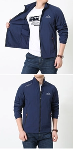Dettaglio della giacca solare da uomo blu navy con trama ripstop e cerniere arancioni