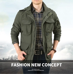 Detail view of army green tactical jacket showing multiple utility chest pockets and collar