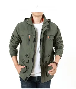 Detail of army green outdoor hooded jacket featuring orange Rough Stock chest print
